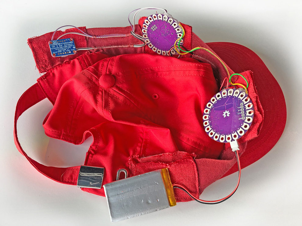 red hat with electronic devices